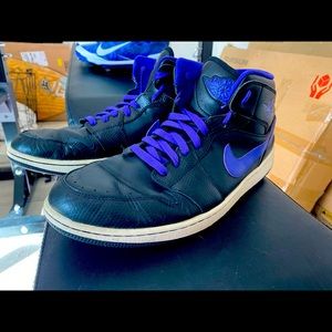 Black and purple air jordans